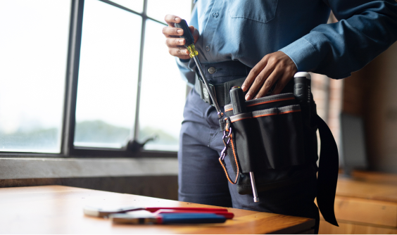 Close up of a man’s tool belt