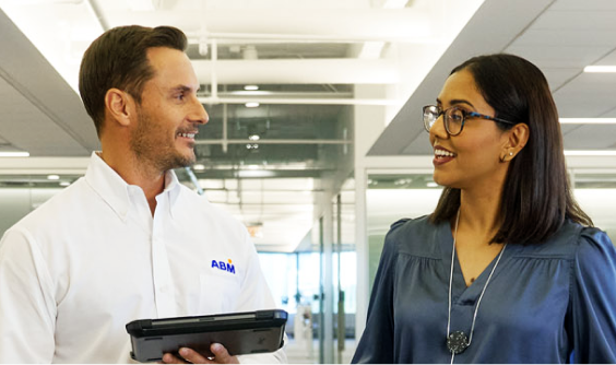 Two people talking in an office